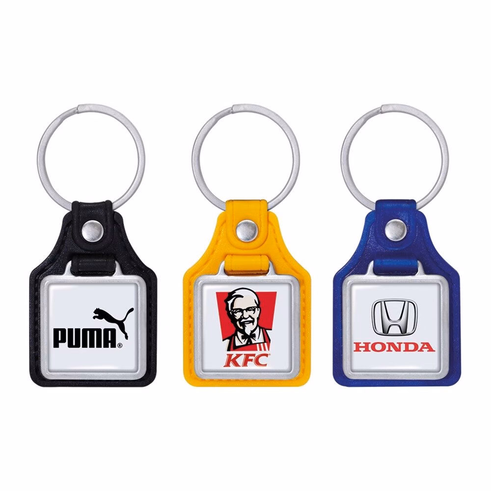 CODE 960 SQUARE LEATHER-ZAMAK KEY CHAIN